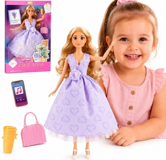 Κούκλα Woopie Lily με μακριά ξανθά μαλλιά 30 cm σε λεβάντα φόρεμα με αξεσουάρ