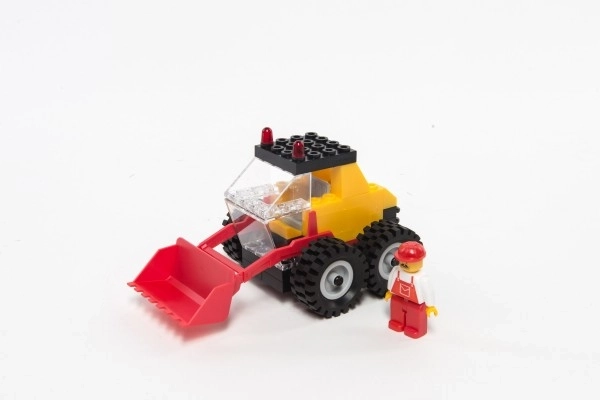 Φορτωτής με κόκκινο φτυάρι