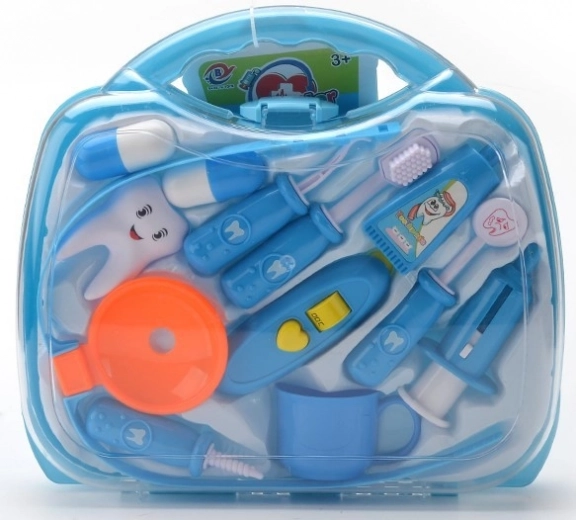 Χαρούμενο βαλιτσάκι γεμάτο οδοντιατρικά εργαλεία